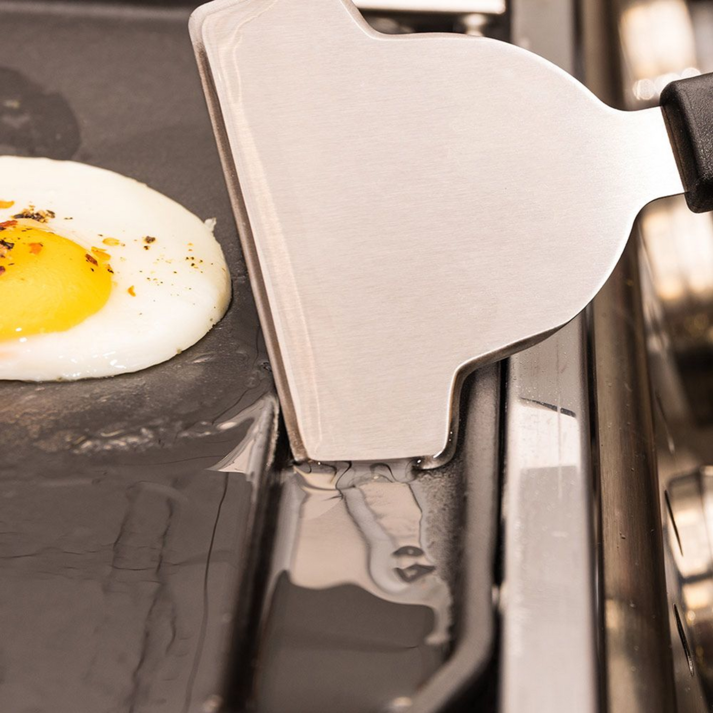 Accessoire de cuisson en fonte pour plancha